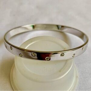 Swarovski” bracelet, less than 50%